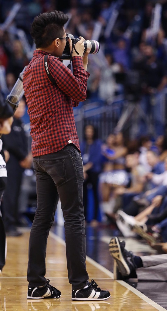 Sean Pitts works the scene during the Milwaukee Bucks at Orlando Magic NBA game at the Amway Center on Thursday, January 29, 2015. Milwaukee won the game 115-100. (Stephen M. Dowell/Orlando Sentinel)